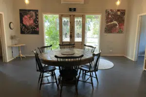 Passionfruit Villa dining table looking out front door